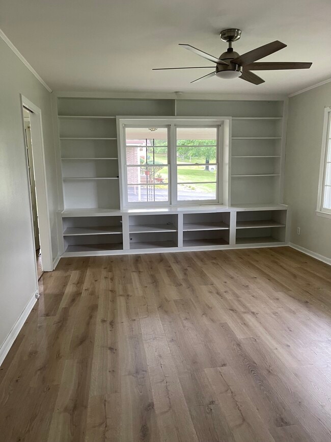 Large living room with built ins. Lots of windows! - 512 Madison Ave