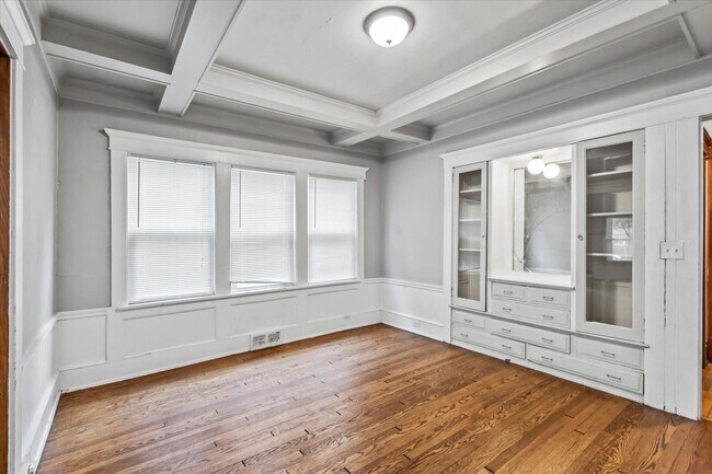 dining room with original built-in cabinets - 1806 E Newberry Blvd