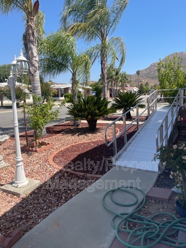 Building Photo - 26057 Fountain Palm Dr