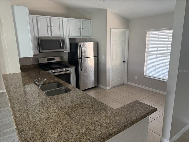 Building Photo - 15318 Margaux Dr