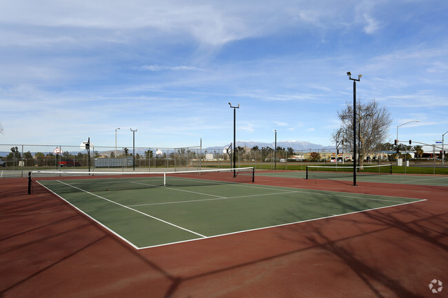 ¡Cancha de tenis - The Hunt Club