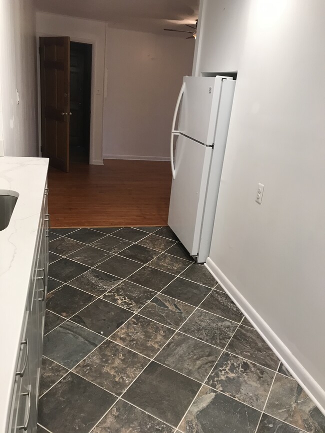 Tiled kitchen floor - 401 Green St