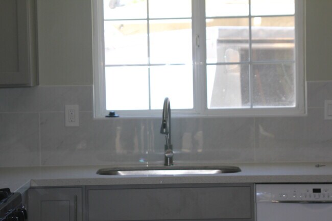 new faucet and sink - 768 N 14th St