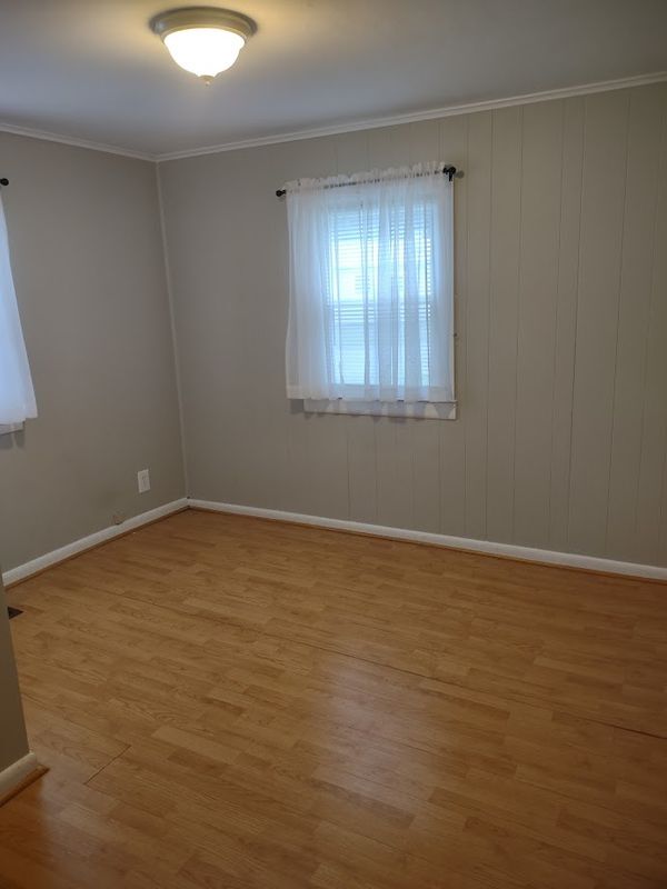 Front Bedroom Laminate floor - 12 Ferro Ave