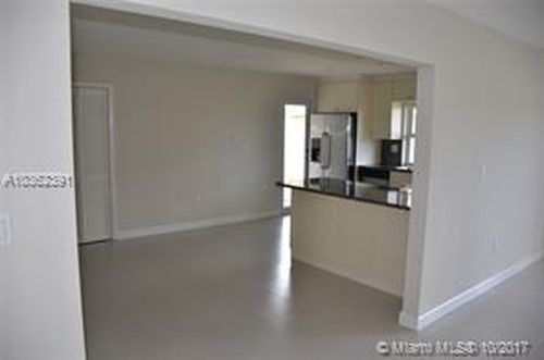 Building Photo - 10151 SW 80th Ave