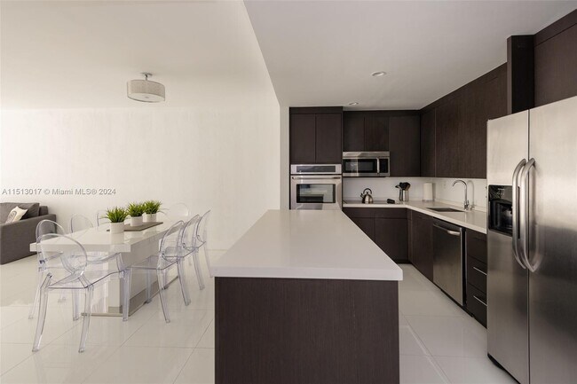Building Photo - 19370 Collins Ave