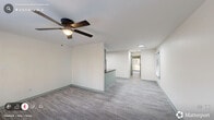 Located at 616 E Knox St. in Durham, NC, this one-bedroom, one-bathroom unit offers a well-organized single-floor layout designed for efficient, comfortable living. Light-toned luxury vinyl plank flooring runs throughout the entire space, creating a cohesive and easy-to-maintain aesthetic. The open-concept kitchen, dining, and living area forms the heart of the home. The kitchen is well-equipped with sage-green cabinetry, dark speckled countertops, stainless steel appliances including a refrigerator, and a functional peninsula that provides additional prep and dining space. The living area is bright and airy, featuring a ceiling fan with light fixture and a sliding glass door that opens to an outdoor deck, allowing natural light to fill the room. The bedroom is comfortably sized, with its own ceiling fan, two closets for ample storage, and a window that brings in additional natural light. The bathroom includes a full tub-shower combination, a vanity with under-sink storage, and vinyl plank flooring that complements the rest of the unit. A dedicated laundry area adds everyday convenience. Neutral wall tones and consistent finishes throughout give this unit a clean, modern feel.
