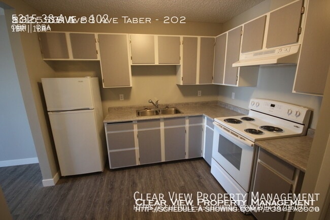 Building Photo - ? Beautifully Renovated One-Bedroom Suite ...