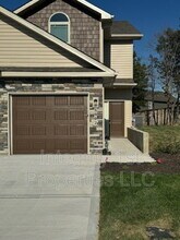 Building Photo - 8827 N Helena Ave