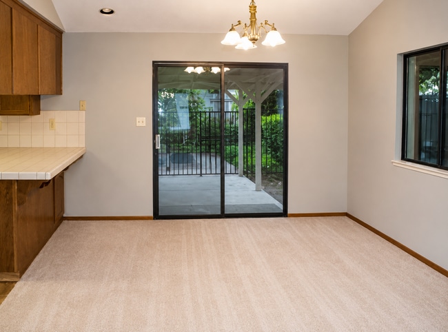Building Photo - Established Neighborhood Gem with Pool & Two-Car Garage