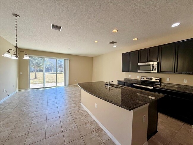 Building Photo - 7020 Woodchase Glen Dr
