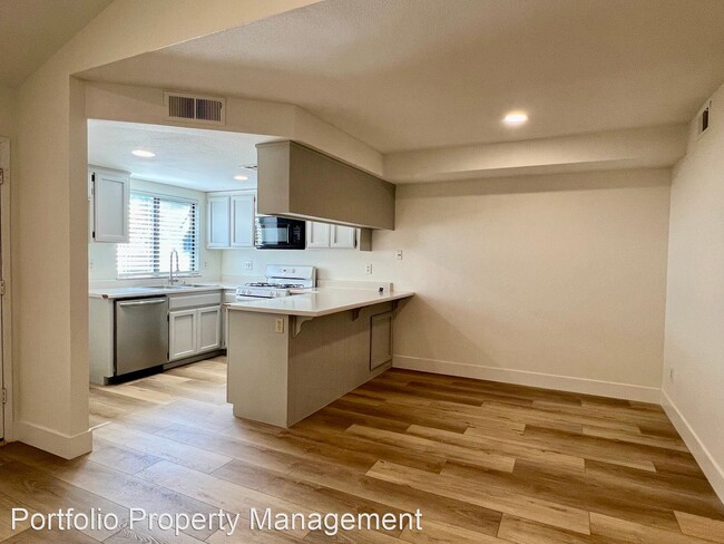 Building Photo - 2 br, 1.5 bath House - 817 Quail Lane # 12