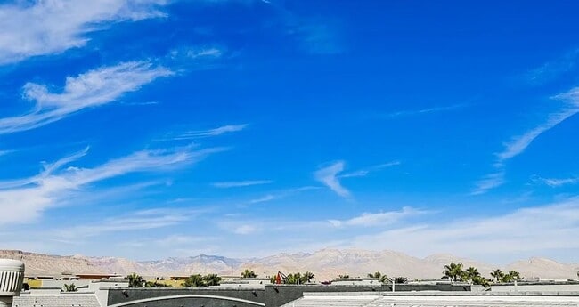 Building Photo - Unique condo with rooftop Strip Views and modern amenities.