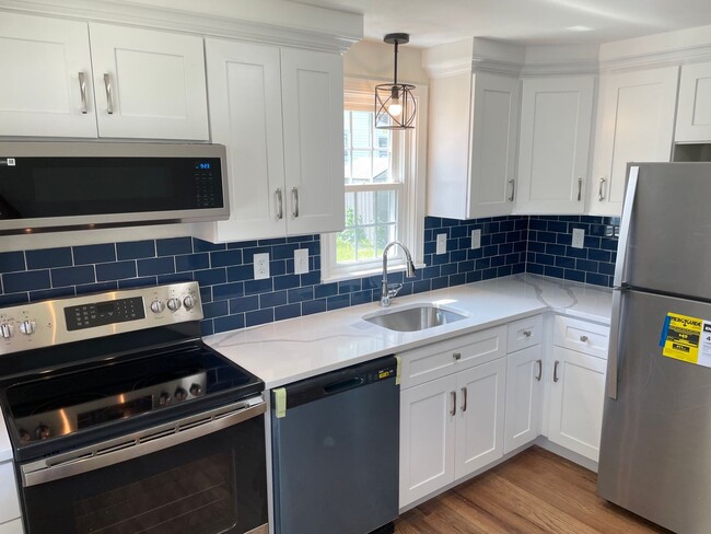 Building Photo - The Blue Backsplash Cape