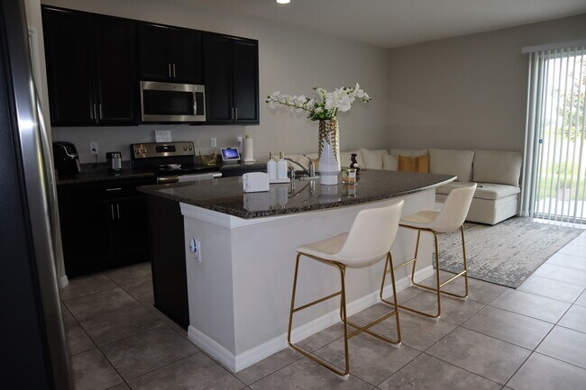 Foto del edificio - 7022 Grand Elm Dr