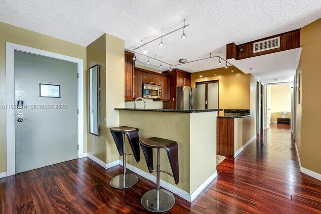 Foto del edificio - 19999 E Country Club Dr