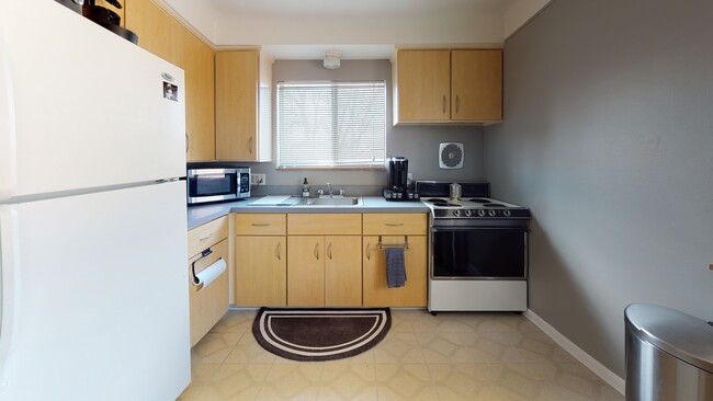 Kitchen with Furnishings - 118-120 N Center St-Walk to Everything V-Tour