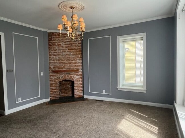 Building Photo - American Tradition Properties