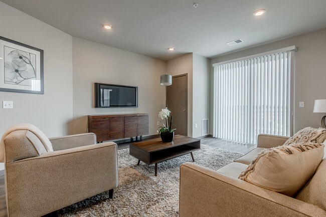 2 Bedroom Living Room - Covered Bridge 1 Residences, LLC