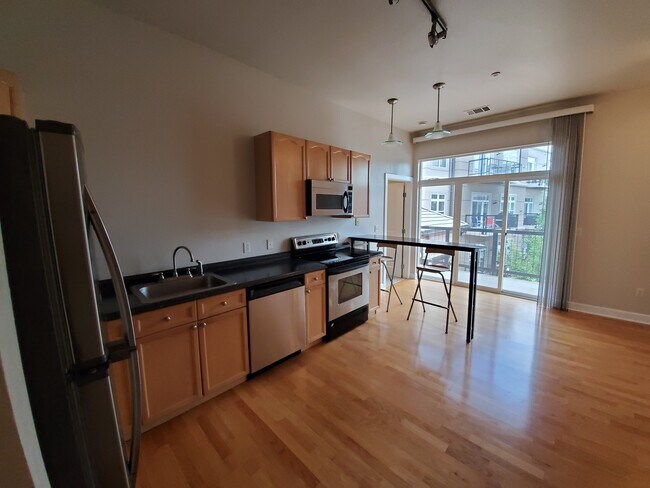 Kitchen / Balcony - 5677 E Park Pl Ave