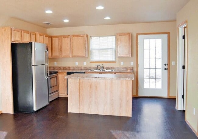 Foto del edificio - 213 S Rolling Woods Way