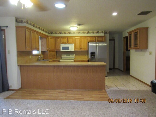 Building Photo - 3 br, 2 bath House - 302 NW Tanglewood Lane