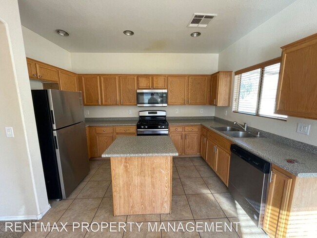 Building Photo - 4 br, 2.5 bath House - 7452 CLARITA CAVERN ST