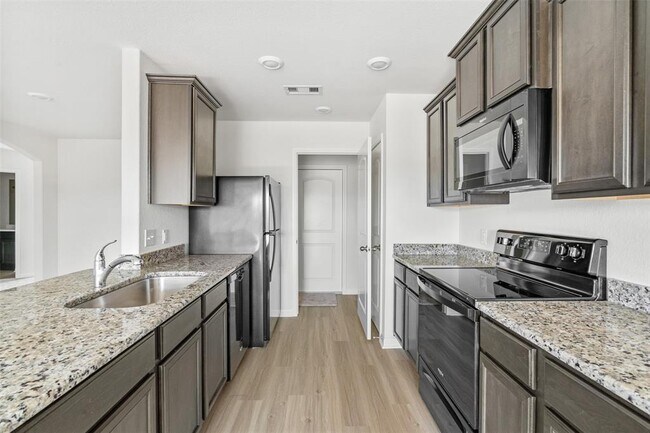 Foto del edificio - 8402 Dusty Ridge Rd