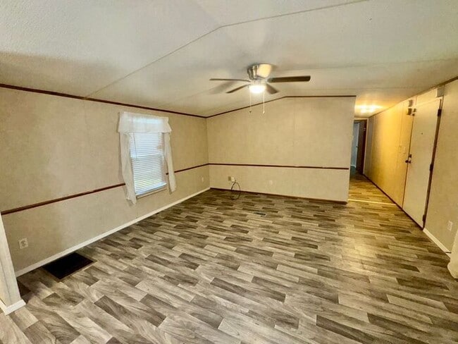 Building Photo - Three bedroom two bath Castleberry manufactured home with a screen porch and carport!