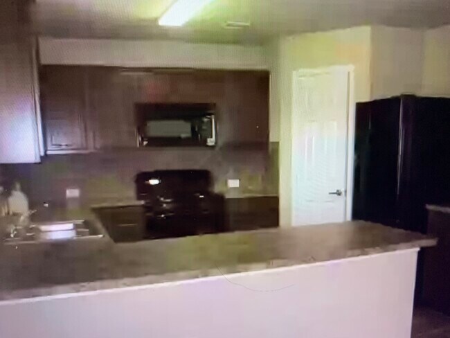 Foto del edificio - 7421 Cedar Edge Dr