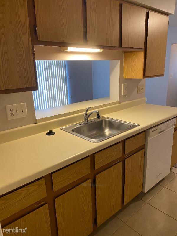 Building Photo - 3916 NW Cinnamon Tree Cir
