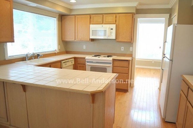 Building Photo - Gorgeous 4 Bedroom Home with Three-Car Garage