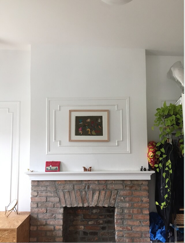 Living room with original fireplace and molding (non-functioning) - 161A 23rd St