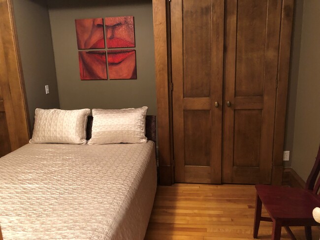 Bedroom with Murphy Bed and Closets on Each Side - 1311 Yale Pl