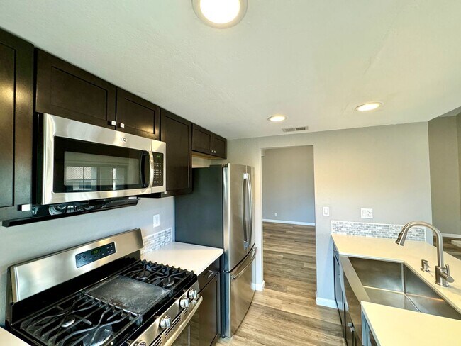 Building Photo - Modern 2BD/2BA San Marcos Condo w/ In-Unit...