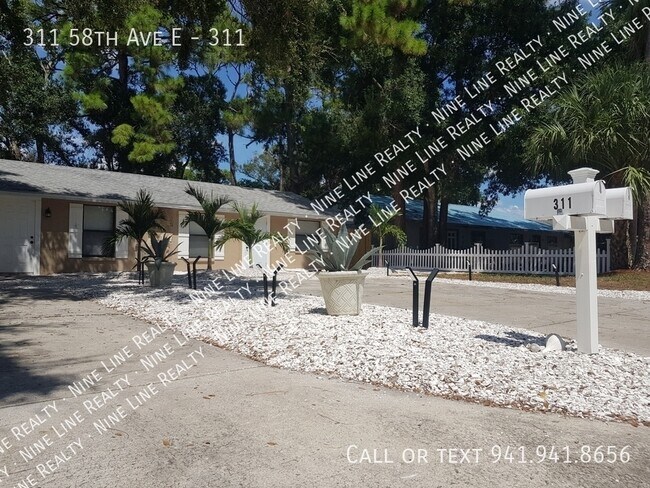 Building Photo - 311 58th Ave E