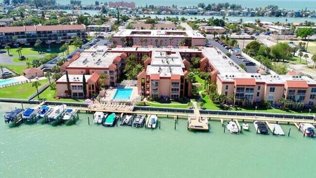Boca shores condominiums. Unit is in the middle bldg towards the intracoastal - 8921 Blind Pass Rd