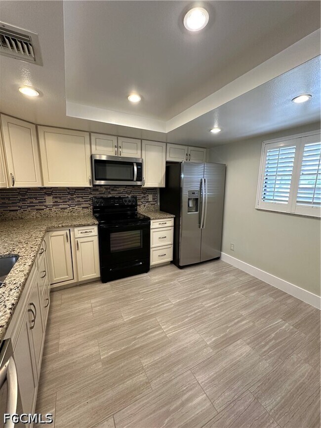 Foto del edificio - 6136 Whiskey Creek Dr