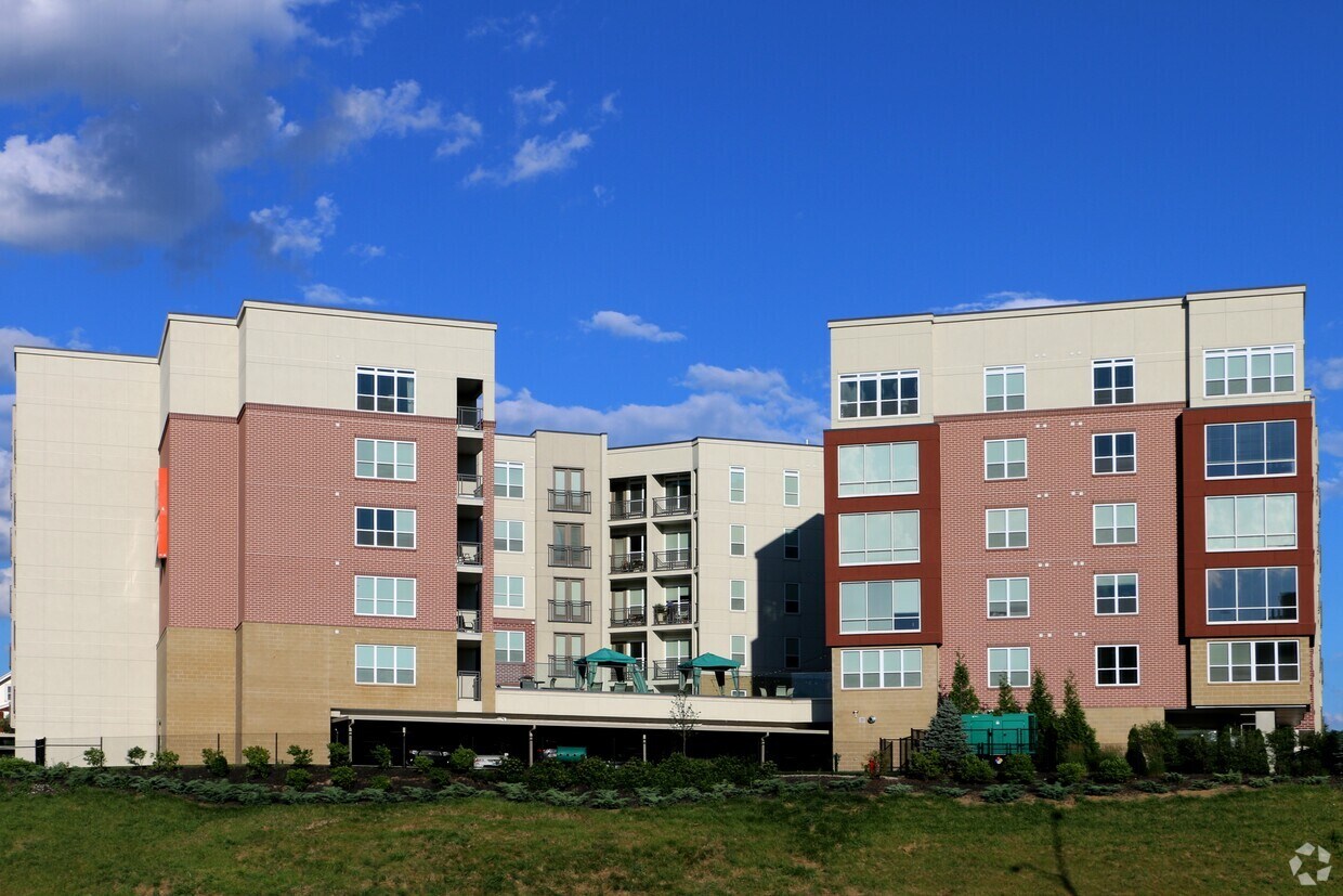 Exterior view of pool area of building. - One Rookwood