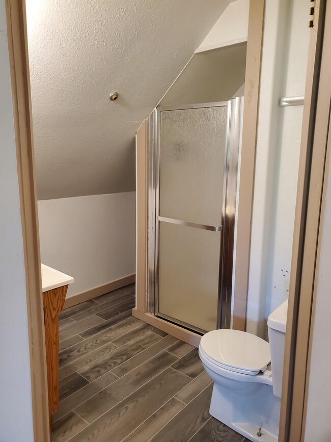 Small bathroom with shower - 410 Main St