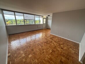 Building Photo - 1061 Queen's Blvd