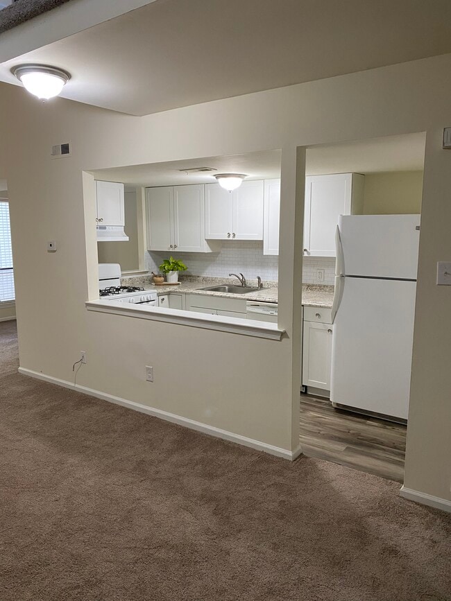 Living room view into kitchen. - 1825 Bridgetown Pike