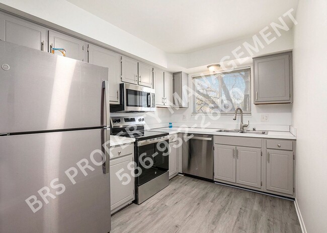 Building Photo - Charming 2-Bedroom Condo in Clinton Twp. –...