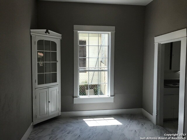 Beautiful charming dinning area room, with glass pantry, with large AC and heating unit. - 217 Rigsby Ave