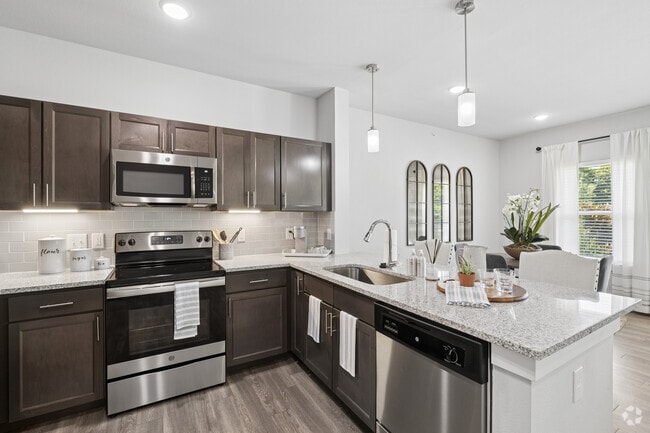 1BR, 1BA - 811SF - Kitchen - Sage Highland Creek 55+ Active Adult