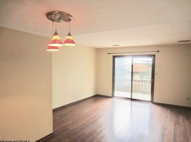 Dining Area Looking into Living Room - 1228 Van Voorhis Rd