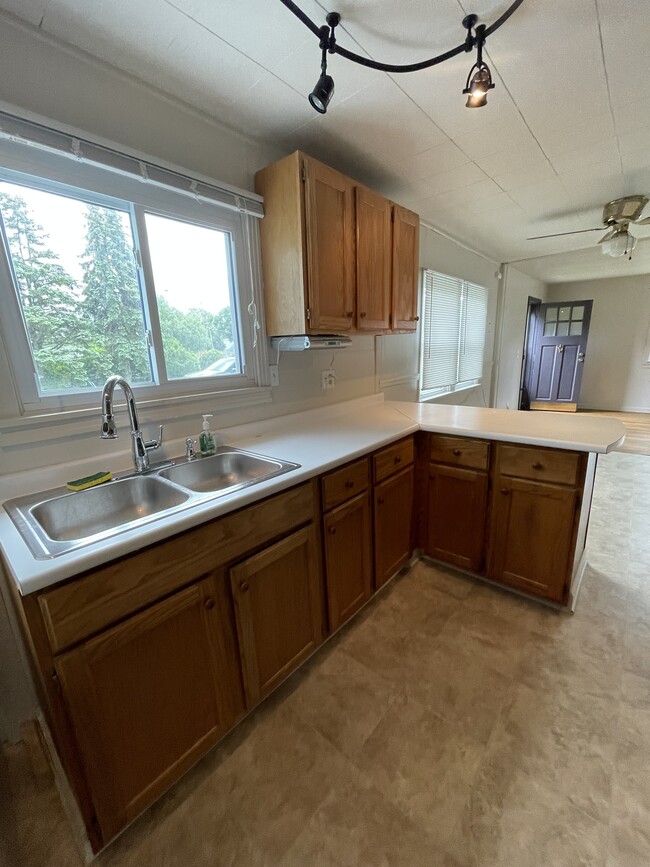 Kitchen with stainless steel double sink - 698 Longmeadow Rd