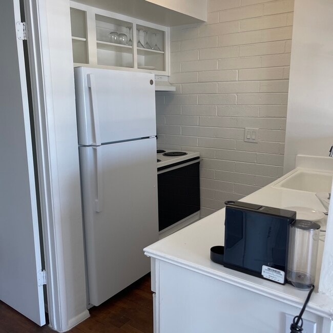White on White cabinets for a Fresh Modern Kitchen! - 301 W Helen St