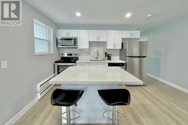 Photo du bâtiment - 57 Oliver St