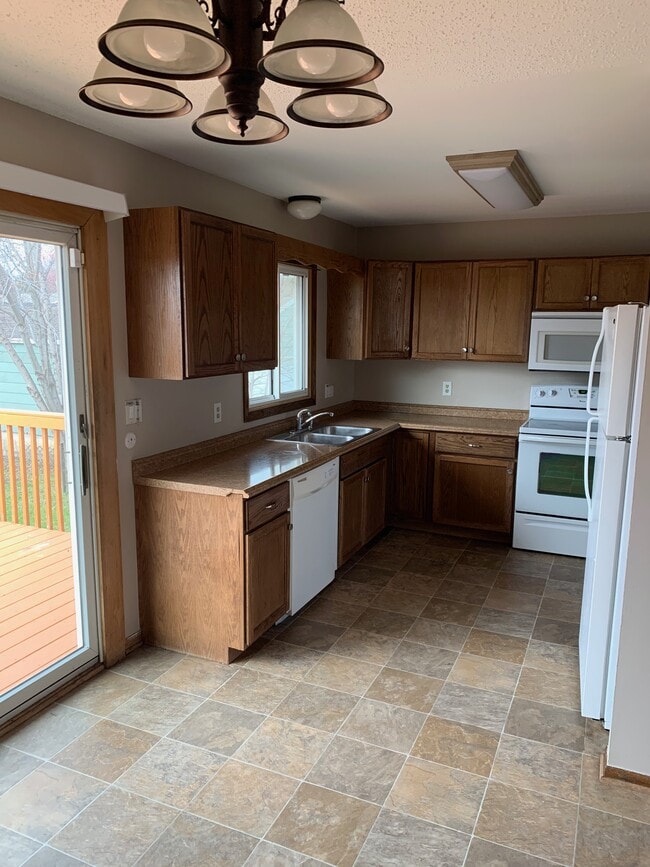 Kitchen, patio to left - 613 30th St NE